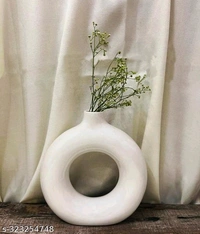 Classic Vases*Material: PCENF5306  CeramicColor: WhiteProduct Length: 6 cmProduct Height: 6 cmProduct Breadth: 2 cmNet Quantity (N): 1Dispatch: 1 Day*Proof of Safe Delivery! Click to know on Safety Standards of Delivery Partners- https://ltl.sh/y_nZrAV3
