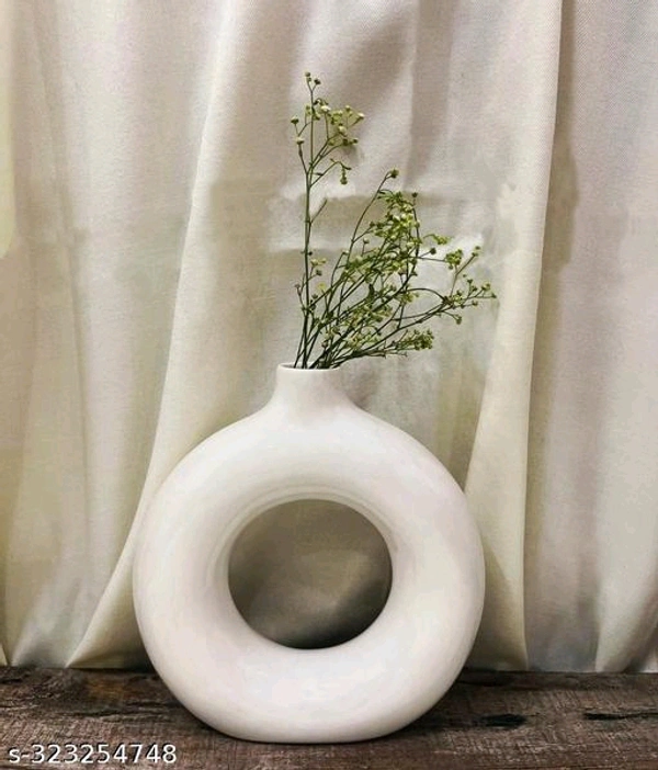 Classic Vases*Material: PCENF5306  CeramicColor: WhiteProduct Length: 6 cmProduct Height: 6 cmProduct Breadth: 2 cmNet Quantity (N): 1Dispatch: 1 Day*Proof of Safe Delivery! Click to know on Safety Standards of Delivery Partners- https://ltl.sh/y_nZrAV3