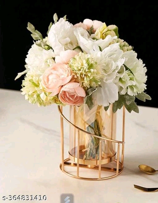 Attractive Vases*Material PCENF5327 : MetalColor: YellowProduct Length: 10.5 cmProduct Height: 10 cmProduct Breadth: 10 cmNet Quantity (N): 1Dispatch: 1 Day*Proof of Safe Delivery! Click to know on Safety Standards of Delivery Partners- https://ltl.sh/y_nZrAV3