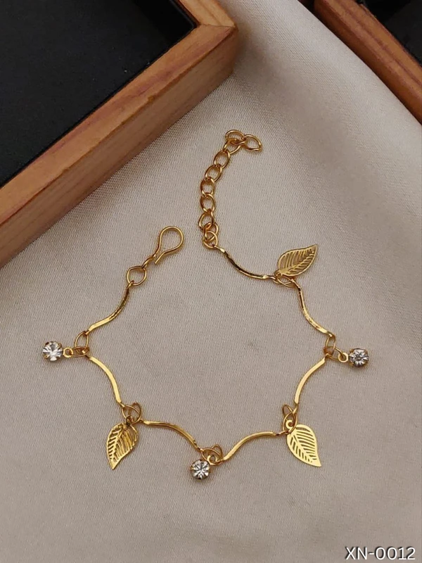 RegalRadiance Gold-Plated Adjustable Bracelet with Exquisite Long Leaf Pattern, Intricately Adorned with Sparkling Cubic Zirconia and American Diamond Accents for Timeless Elegance