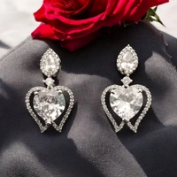 Shiny Gold  Diamond Embrace: This name highlights the beautiful combination of diamonds and the heart shape - White, Free, American Diamonds