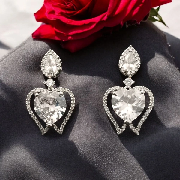 Shiny Gold  Diamond Embrace: This name highlights the beautiful combination of diamonds and the heart shape - White, Free, American Diamonds