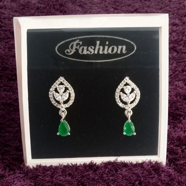 Shiny Gold  Emerald Elegance: This name highlights the beautiful green color of the stones and the overall elegance of the design. - Japanese Laurel, Free, American diamonds