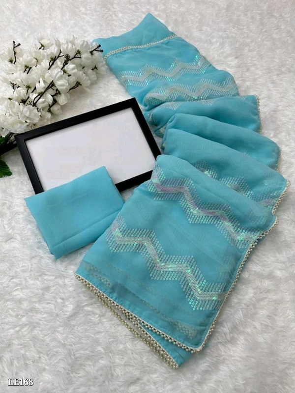 Catalog Name: *Heavy Chifon Georgette Fabric With All Over Sequence Work And Pari Designer Lace Border*

*SAREES FABRIC*:-Heavy Chifon Georgette fabric with all over sequence work and pari  designer lace border*

*Blouse*:-Running blouse

Length:-5.50 MTR sarees and 0.80 mtrblouse*

*Design your Desire*

Brand Name: *Lilu Ethnics*

 - Free