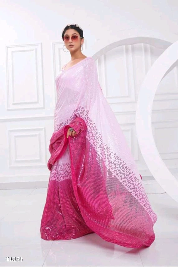 Catalog Name: *Bollywood Style Heavy Sequence Work Saree*

SAREES FABRIC.:-
Georgette with dual shade peding

*Blouse :- satin silk

Work:-5 Mm 3 Mm dual Seqwance work with  support Lace border with piping

Length5.50 MTR sarees and 0.80 MTR blouse

*Design your Desire*

Brand Name: *Lilu Ethnics*

_*Free Shipping! COD Available! Returns Available!*_
 - Free