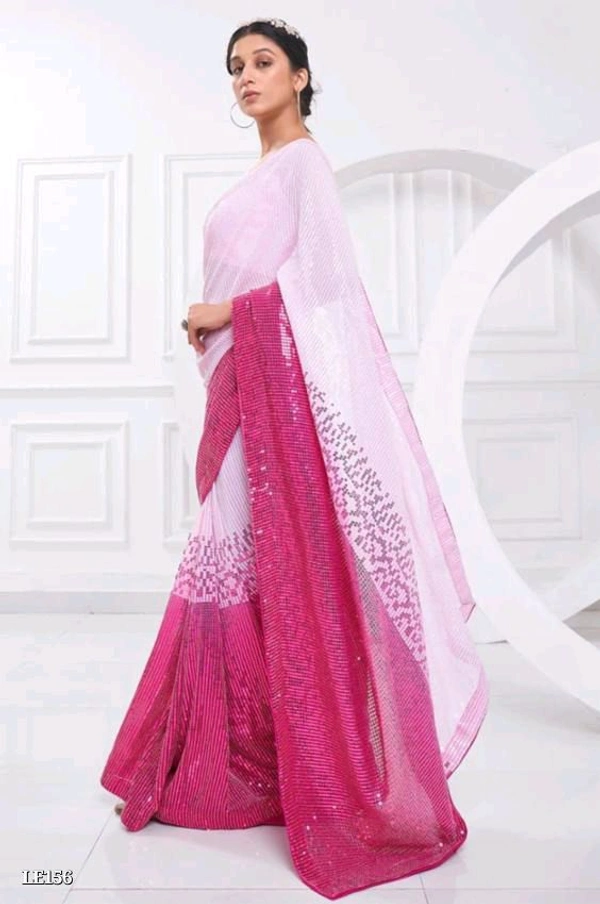 Catalog Name: *Bollywood Style Heavy Sequence Work Saree*

SAREES FABRIC.:-
Georgette with dual shade peding

*Blouse :- satin silk

Work:-5 Mm 3 Mm dual Seqwance work with  support Lace border with piping

Length5.50 MTR sarees and 0.80 MTR blouse

*Design your Desire*

Brand Name: *Lilu Ethnics*

_*Free Shipping! COD Available! Returns Available!*_
 - Free