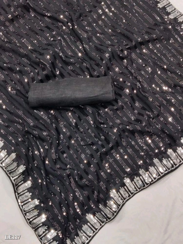 Catalog Name: *Black Heavy Party Wear Sequence Work Saree*

*Presenting you most beautiful seqwance saree collection * 

👇 Fabric details 👇

🛑SAREE FABRIC- Georgette 
🛑SAREE LENGTH- 5.50 Mtr  
🛑SAREE WORK-  Sequence 🪡 work with  Sequence lace 

🛑BLOUSE FABRIC- Heavy mono silk

Classic and elegant, this saree will be a perfect addition to your ethnic wardrobe, offerin - Free