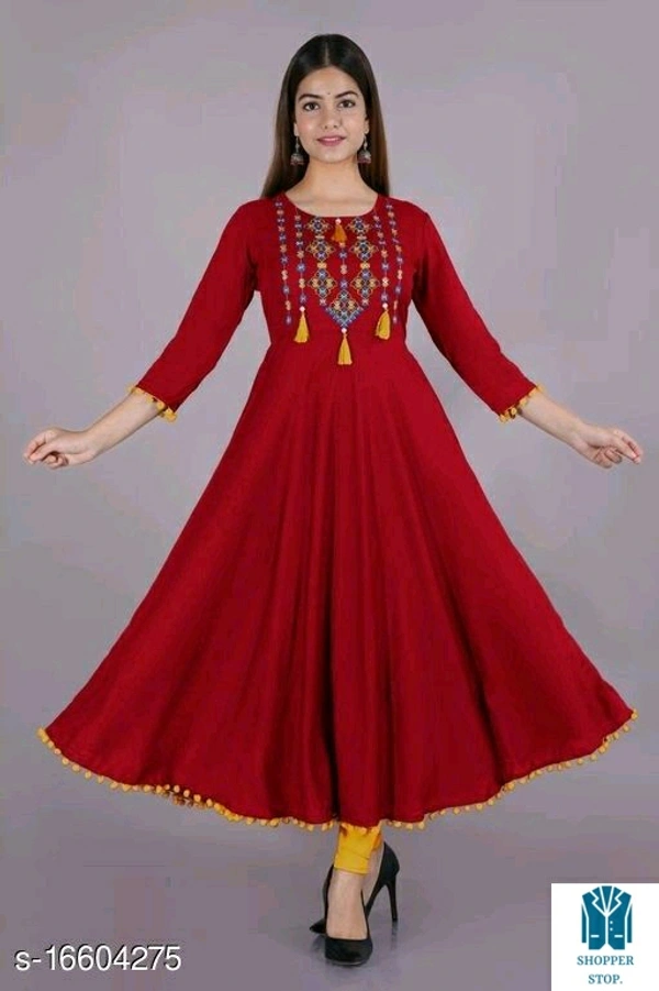 Catalog Name:*⚡Women Rayon Anarkali Embroidered Yellow Kurti*Fabric: RayonSleeve Length: Three-Quarter SleevesPattern: Embroidered