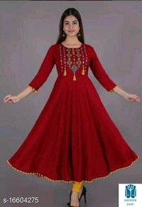 Catalog Name:*⚡Women Rayon Anarkali Embroidered Yellow Kurti*Fabric: RayonSleeve Length: Three-Quarter SleevesPattern: Embroidered