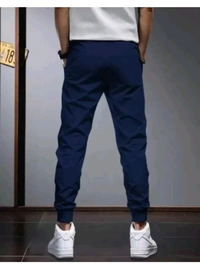 Drm Knitwear  ₹200 WCP Self Design Men Black Track Pants qjc6mz M 214 - Navy Blue, L