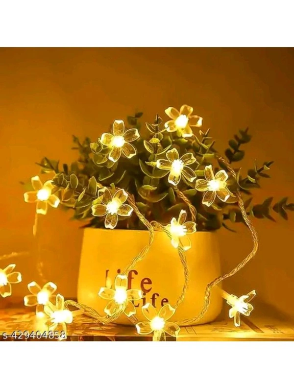 USD$9  Ujjwanix Enterprises Flower String Light| 14 LED 3 M Silicone Light| LED Decoration Light| Warm White Light for Home, Garden, Party, Diwali  rb.gy/fe0fjh
