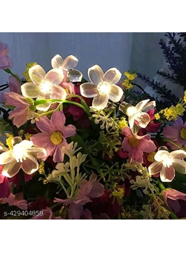 USD$9  Ujjwanix Enterprises Flower String Light| 14 LED 3 M Silicone Light| LED Decoration Light| Warm White Light for Home, Garden, Party, Diwali  rb.gy/fe0fjh
