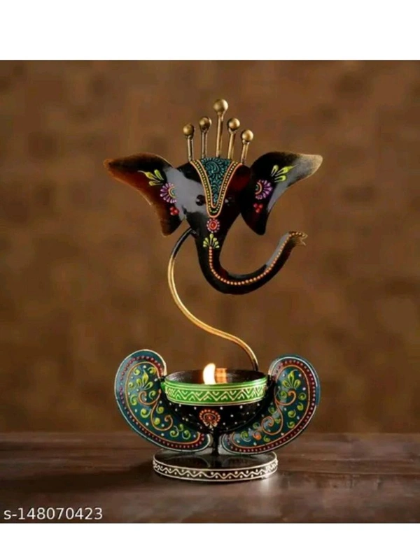 USD$10 HANDICRAFY Name: Handicrafy Metal Vinayaka/ Laddu Ganesha  / Table Decorative showpiece / Diya Holder / Loban Dhoop / Incense Burner / Ganpati/ Ganesha Tea Light Candle Holder for Dewali Decoration, Diwali Gift, Corporate Gift, Table Decor, Pooja Room Decor. 
www.meesho.com/s/p/2g5nvb?utm_source=s_cc