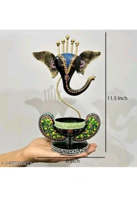 USD$10 HANDICRAFY Name: Handicrafy Metal Vinayaka/ Laddu Ganesha  / Table Decorative showpiece / Diya Holder / Loban Dhoop / Incense Burner / Ganpati/ Ganesha Tea Light Candle Holder for Dewali Decoration, Diwali Gift, Corporate Gift, Table Decor, Pooja Room Decor. 
www.meesho.com/s/p/2g5nvb?utm_source=s_cc