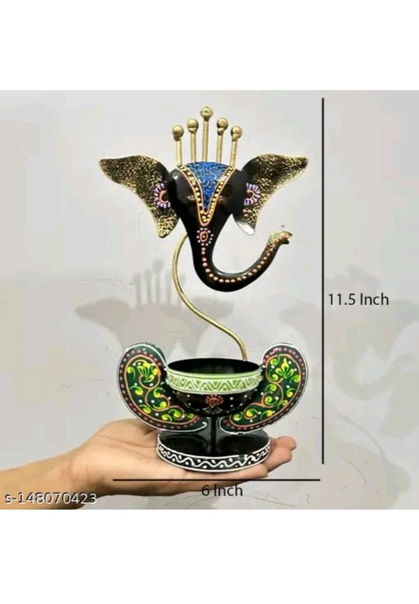 USD$10 HANDICRAFY Name: Handicrafy Metal Vinayaka/ Laddu Ganesha  / Table Decorative showpiece / Diya Holder / Loban Dhoop / Incense Burner / Ganpati/ Ganesha Tea Light Candle Holder for Dewali Decoration, Diwali Gift, Corporate Gift, Table Decor, Pooja Room Decor. 
www.meesho.com/s/p/2g5nvb?utm_source=s_cc