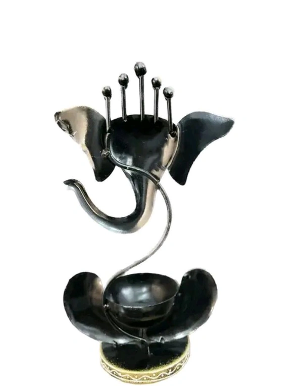 USD$10 HANDICRAFY Name: Handicrafy Metal Vinayaka/ Laddu Ganesha  / Table Decorative showpiece / Diya Holder / Loban Dhoop / Incense Burner / Ganpati/ Ganesha Tea Light Candle Holder for Dewali Decoration, Diwali Gift, Corporate Gift, Table Decor, Pooja Room Decor. 
www.meesho.com/s/p/2g5nvb?utm_source=s_cc