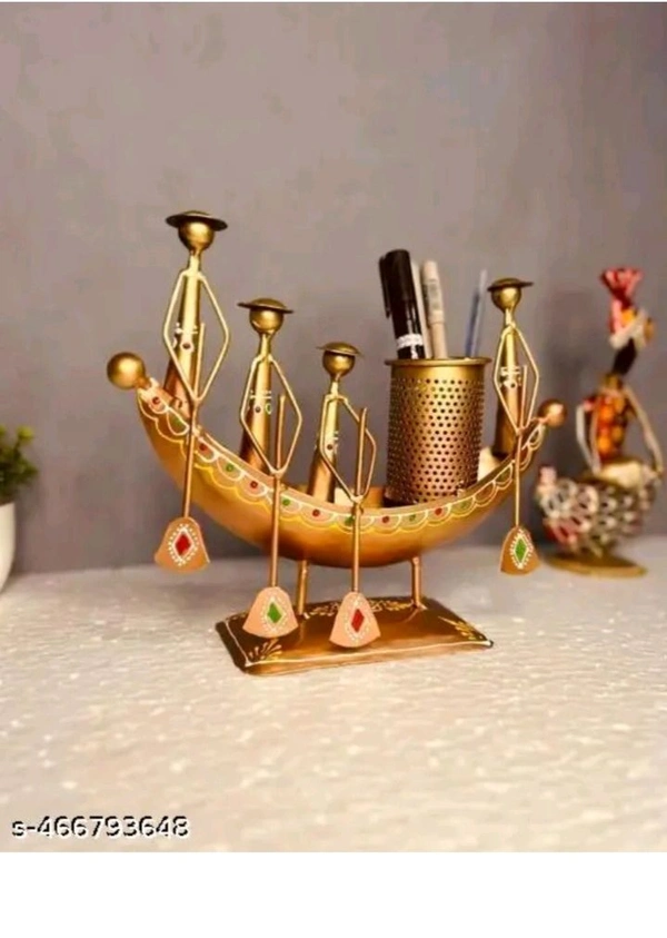 USD$11 @balaji_incorporation 
Name: BALAJI INDUSTRIES LIMITED Metal Home Decor,Long Kerala Boat Showpiece, Pen Stand, Flower Pot, Multicolour Handcrafted Boat Holder, Table Decor, Rajasthani Musician Ethnic Office Organizer, Artistic Home Decor, Traditional Indian Art, Unique Desk rb.gy/z953j3