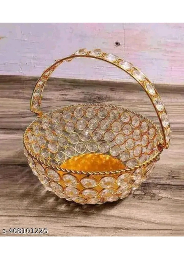 USD$10 M M Handicrafts Name: Decorative crystal basket gold colour luxury showpiece. Decorative showpiece basket gold colour water proof shining crystal material iron and crystal height 7 inch pack of 1 piece use for home decoration table decoration living room office badroom study table gift pack flower use butiful luxury showpiece crystal basket Country of Origin: India rb.gy/ztwg4l