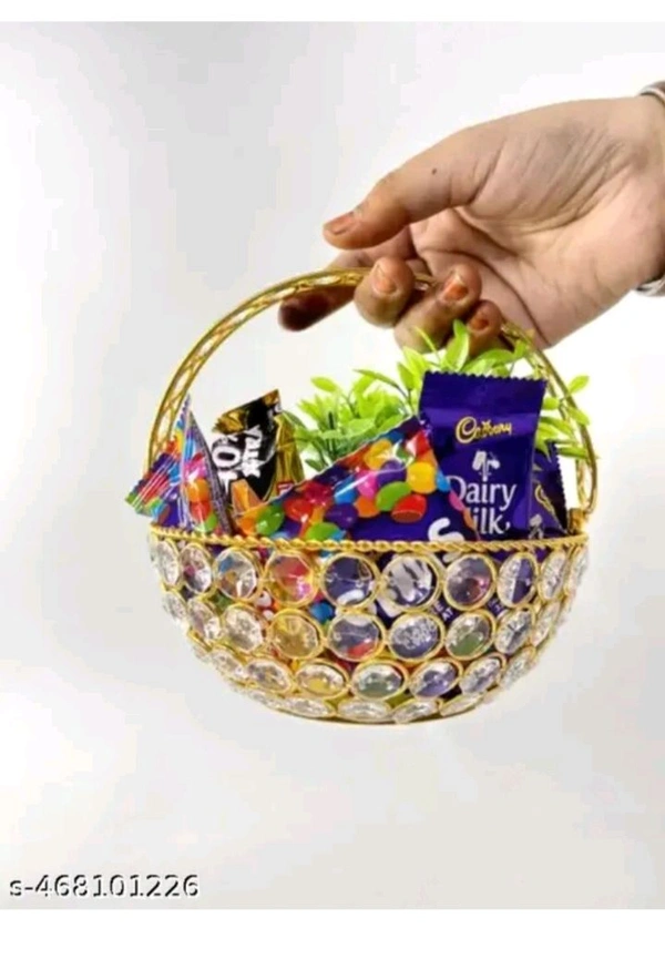 USD$10 M M Handicrafts Name: Decorative crystal basket gold colour luxury showpiece. Decorative showpiece basket gold colour water proof shining crystal material iron and crystal height 7 inch pack of 1 piece use for home decoration table decoration living room office badroom study table gift pack flower use butiful luxury showpiece crystal basket Country of Origin: India rb.gy/ztwg4l