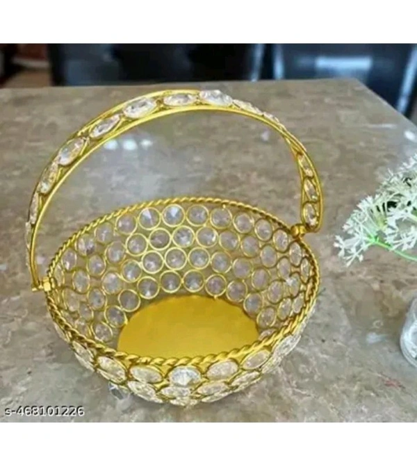 USD$10 M M Handicrafts Name: Decorative crystal basket gold colour luxury showpiece. Decorative showpiece basket gold colour water proof shining crystal material iron and crystal height 7 inch pack of 1 piece use for home decoration table decoration living room office badroom study table gift pack flower use butiful luxury showpiece crystal basket Country of Origin: India rb.gy/ztwg4l