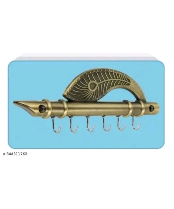 ZA0015 USD $ 10.00 AMAR ENTERPRISE Name: stylish key holders  Flute & Peacock Quills Key Stand Key Holder for Home & Office Antique Brass rb.gy/h3ysdp