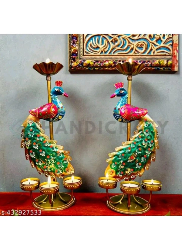 ZA0049 USD $ 18.00 Handicrafy Name: Handicraft Metal Peacock Pair Candle Holder Showpieces