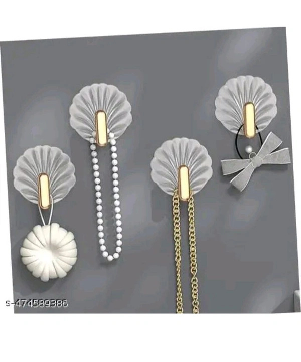ZA0074 USD $ 10.00 Dwija Enterprise Name: Shell-Shaped Creative Self-Adhesive Hooks – Multifunctional Sticky Wall Hooks for Easy Installation in Kitchen, Bathroom, Office, and Home – No Drilling, Strong Hold, Space-Saving, Stylish Design (Pack of 4) rb.gy/wx1b3f