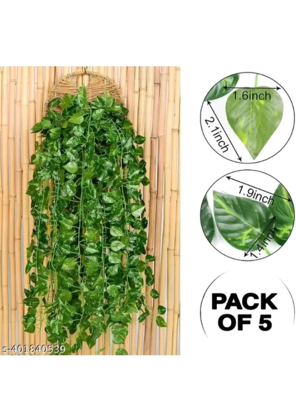 ZA0084 USD $ 10.00 The aayesha enterprise Name:  (7 Feet) (Set of 5 String) 30 Leave in one String Artificial Garlands Money Plant Hanging Leaves Greenery Vine Creeper Plants for Home Decor Main Door Wall, Balcony, Office, Decoration Party & rb.gy/ytt9l0