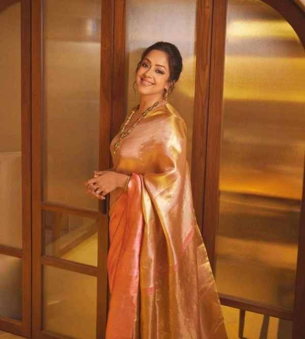 B04009 Trending Jothika Mam Gold Tissue Silk Saree