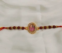 Jai Guruji Rakhi Potli- Guruji Swaroop Stand With Rakhi