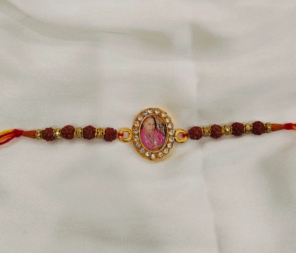 Jai Guruji Rakhi Potli- Guruji Swaroop Stand With Rakhi