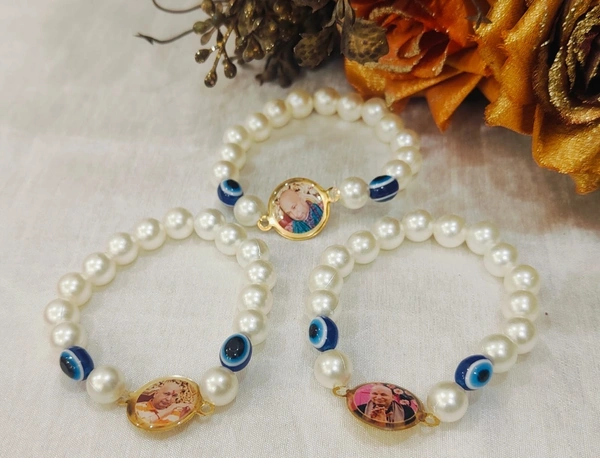 Jai Guruji Pack Of 10 Bracelets White Pearl With Evil Eye - White, Free Size
