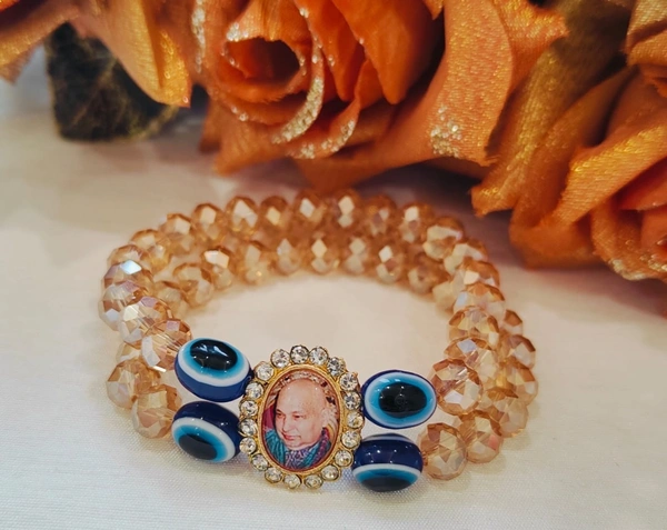 Jai Guruji Crystal And Evil Eye Bracelet - Gold, Free Size