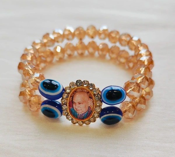Jai Guruji Crystal And Evil Eye Bracelet - Gold, Free Size