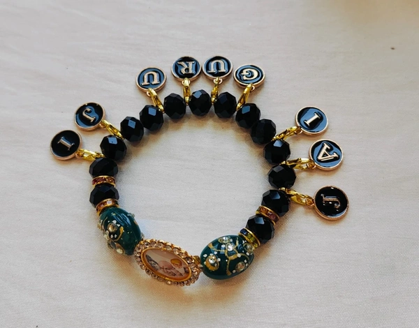 Jai Guruji Charm Bracelet  - Black, Free Size