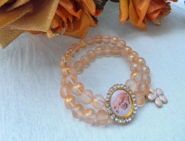 Jai Guruji Bracelet With Flower Charm - Golden Tainoi, Free Size