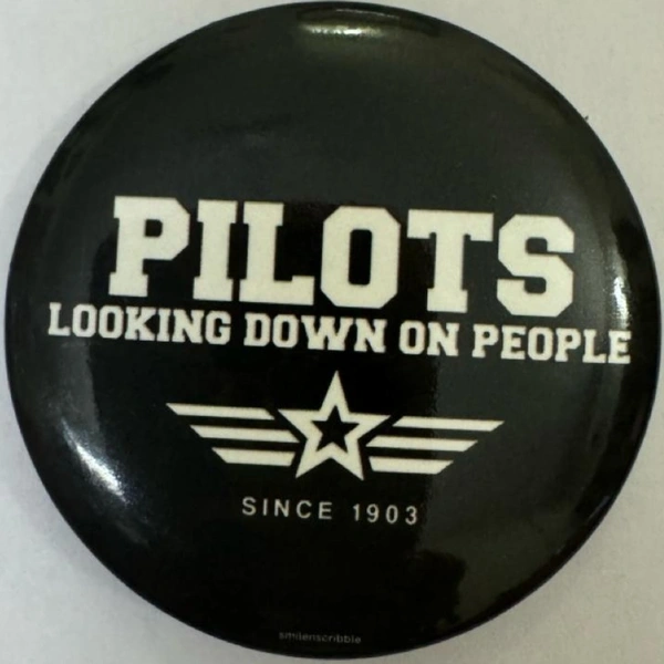 PILOTS LOOKING DOWN AT PEOPLE 