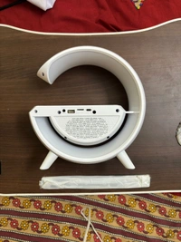 G shaped Bluetooth speaker cum wireless charger 