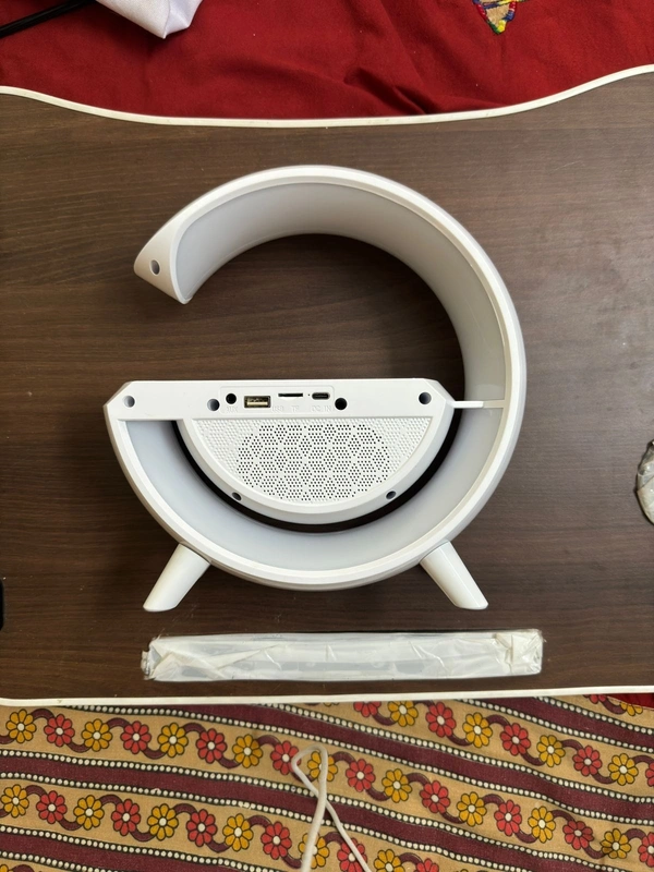 G shaped Bluetooth speaker cum wireless charger 