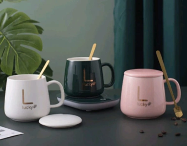 COFFEE CUP N SAUCER WITH ELECTRIC WARMER