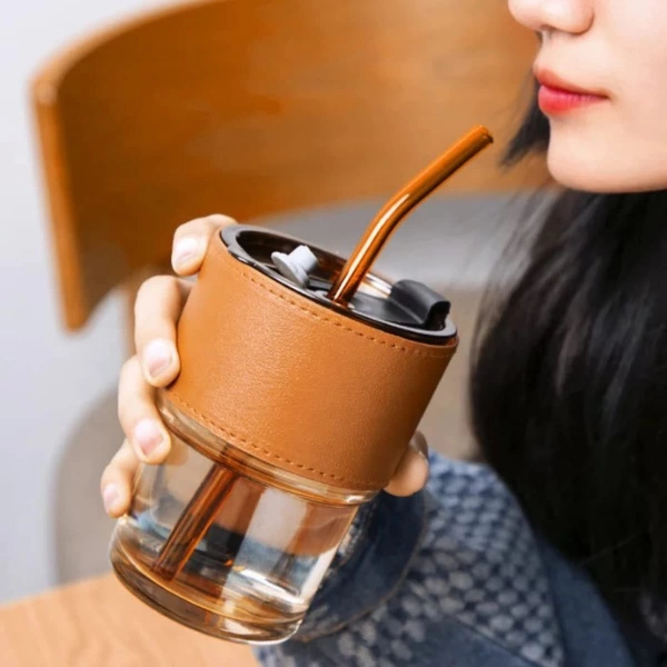 GLASS TUMBLER WITH GLASS STRAW AND LEATHER SLEEVE