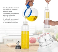 RSDD2288A 1LTR OIL DISPENSERWITH LID - CLEAR, DRIP FREE SPOUT, CONTROLLED USE