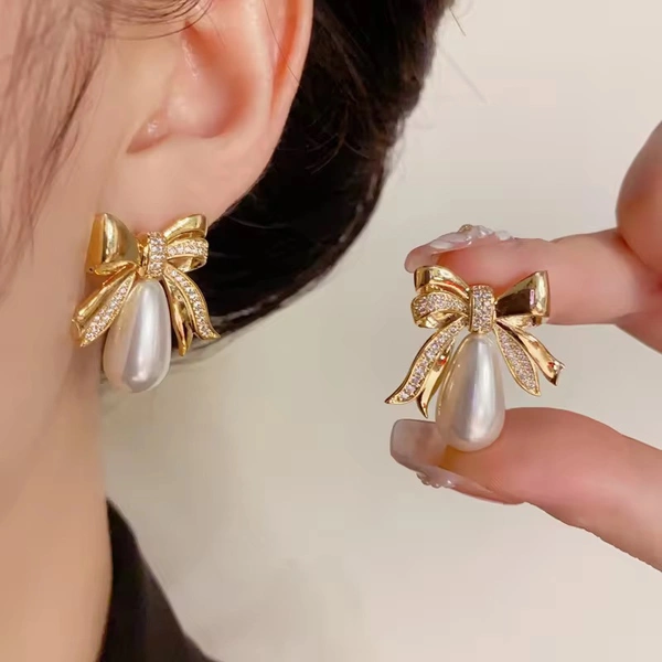 Korean Gold-Plated Bow Shaped Pearl Stud Earrings - Free Size