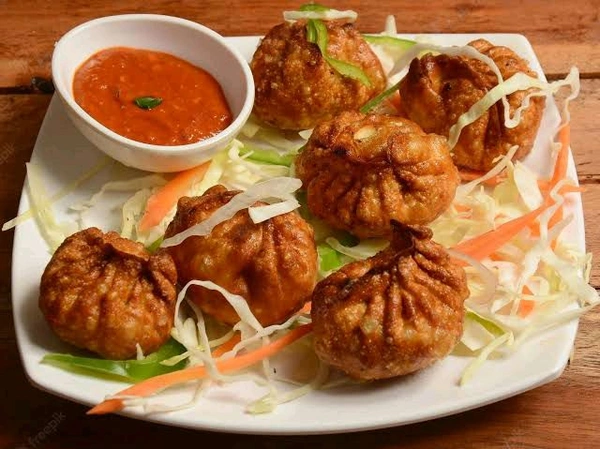 ZAIKA RESTURANT  Veg Momo ( Fried)