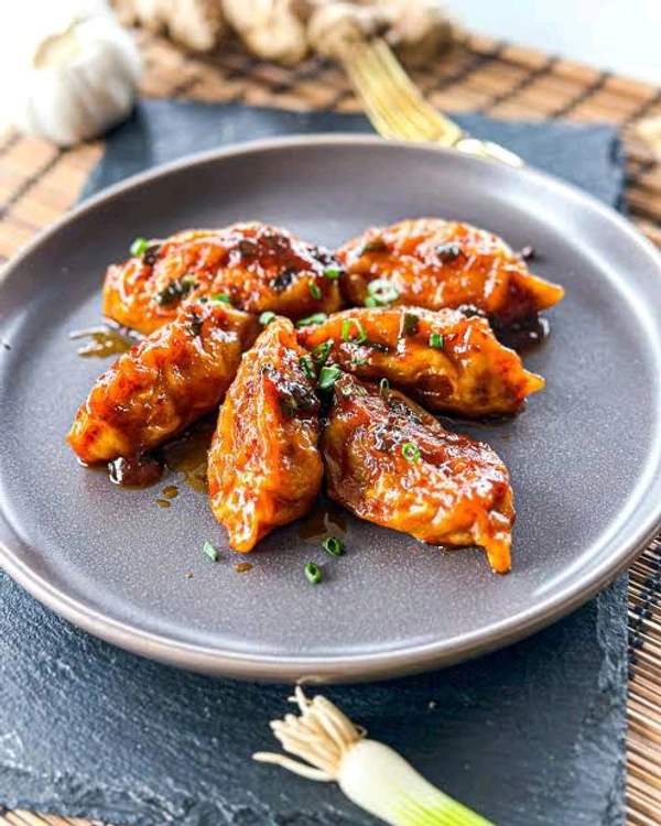 ZAIKA RESTURANT  Veg Momo ( Pan Tossed)