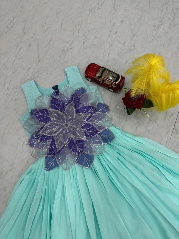 *👗Frock👗*
*Fabric:-* Parampara Silk
*Work:-* Fancy Flowers Cutting Pasting Work - Xl To Xxl