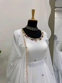 Looking for this same colour beautiful Designer Anarkali on Faux Georgette With Hand work and Pent on Crep febric and Dupatta on also Faux Georgette febri With hand work & Facy Lace. - Xl