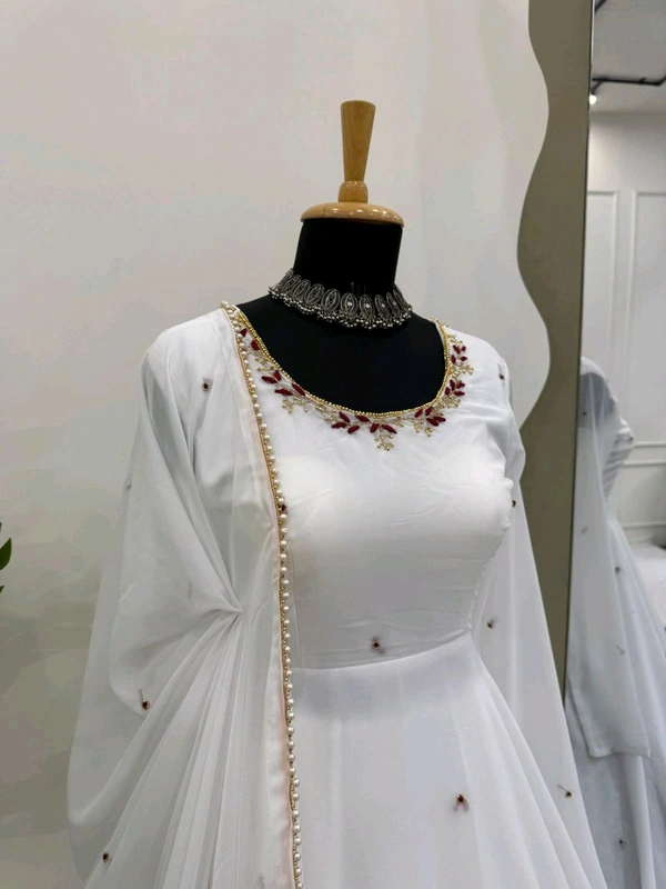 Looking for this same colour beautiful Designer Anarkali on Faux Georgette With Hand work and Pent on Crep febric and Dupatta on also Faux Georgette febri With hand work & Facy Lace. - Xl