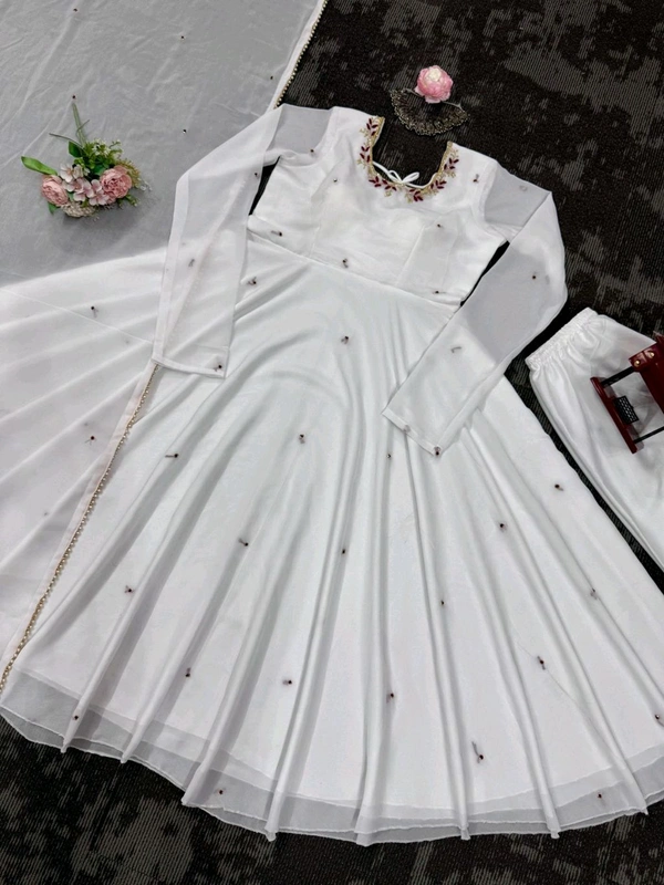 Looking for this same colour beautiful Designer Anarkali on Faux Georgette With Hand work and Pent on Crep febric and Dupatta on also Faux Georgette febri With hand work & Facy Lace. - Xl