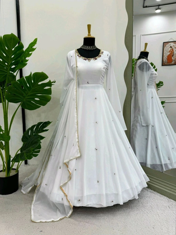 Looking for this same colour beautiful Designer Anarkali on Faux Georgette With Hand work and Pent on Crep febric and Dupatta on also Faux Georgette febri With hand work & Facy Lace. - Xl